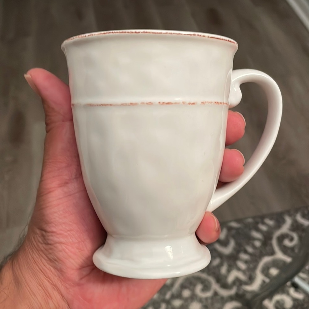 Generic white mug with red lining and unique shape